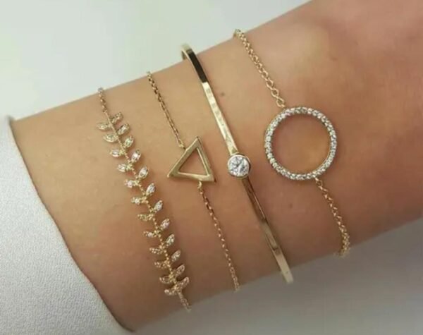 Pack of 4 gold-plated adjustable bracelets with American diamonds, displayed elegantly on women's hands, showcasing their unique designs and luxurious appeal.