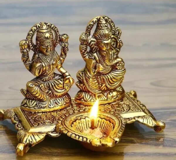 Laxmi Ganesh with Diya Murti crafted in premium metal, symbolizing wisdom, prosperity, and light.