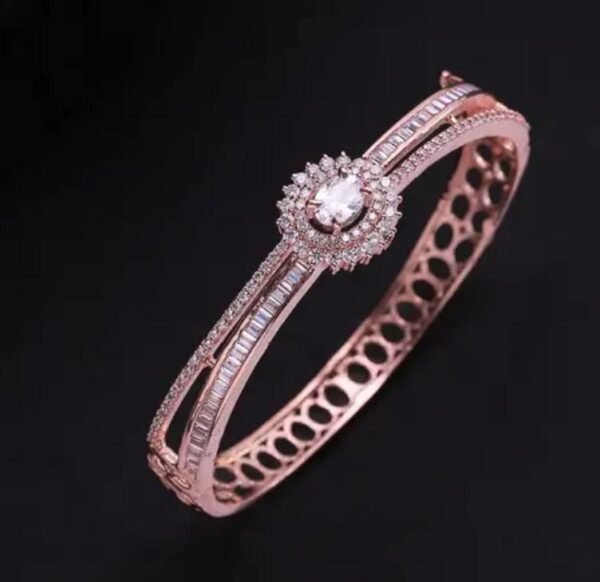Graceful Radiance Rose Gold-Plated Bracelet displayed on a black background to emphasize the brilliance of the rose gold and dazzling cubic zirconia stones.