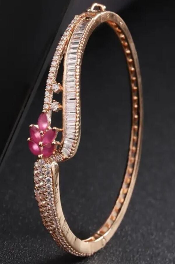 Eternal Blossoms Rose Gold-Plated Ruby and American Diamond Bracelet displayed on a black background, emphasizing the brilliance of the rose gold and stones.