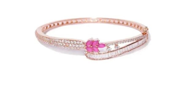 Close-up view of the Eternal Blossoms Rose Gold-Plated Bracelet on a white background, focusing on the intricate floral pattern and sparkling stones.