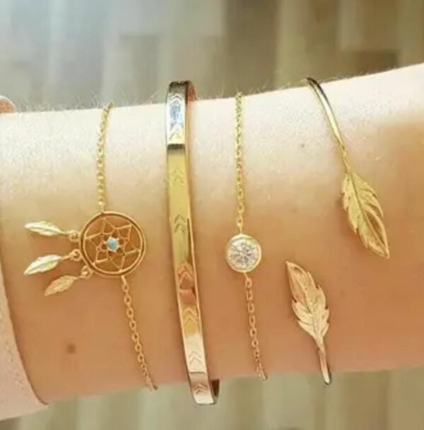 Main image showcasing a set of four gold-plated bracelets with intricate leaf and floral designs.