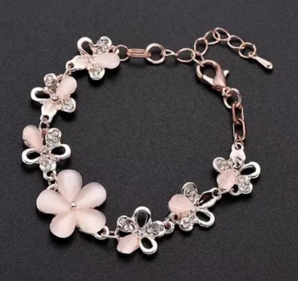 Elegant Flower Rose Gold-Plated Crystal Bracelet displayed on a black background to emphasize the luxurious rose gold plating.