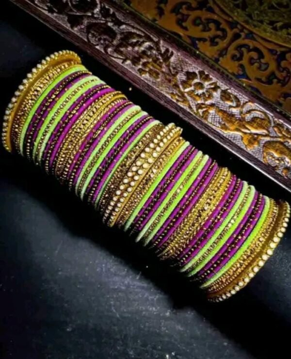 Main image showcasing the Elegant Light Green and Pink Chuda, wrapped in vibrant silk thread and adorned with sparkling white stones.