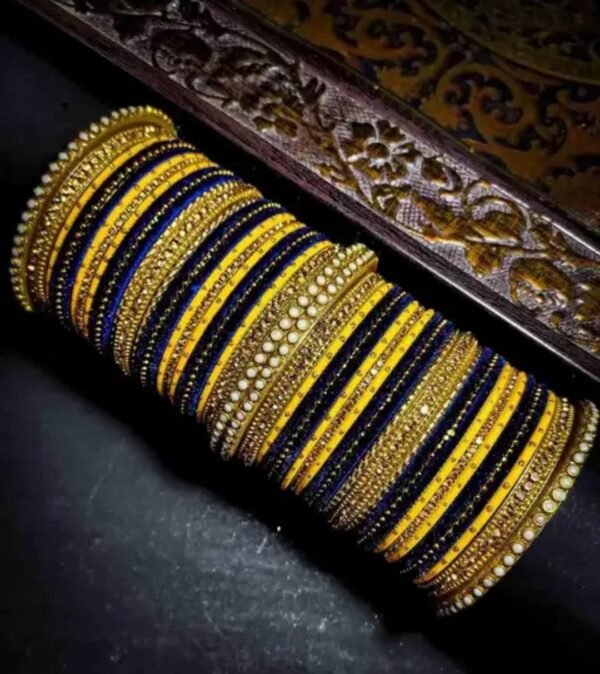 Main image showcasing the Elegant Yellow and Navy Blue Chuda, wrapped in vibrant silk thread and adorned with sparkling white stones.