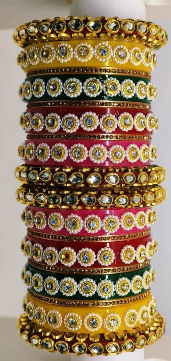 Multicolored Rajasthani Chuda split into two sets for each hand, showcasing intricate kundan stone work and vibrant hues.