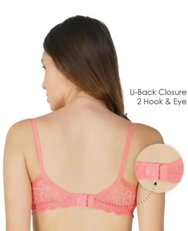 A model wearing the T-Shirt Bra in Pink, showcasing its soft cotton blend fabric, padded cups, and seamless construction for everyday comfort.
