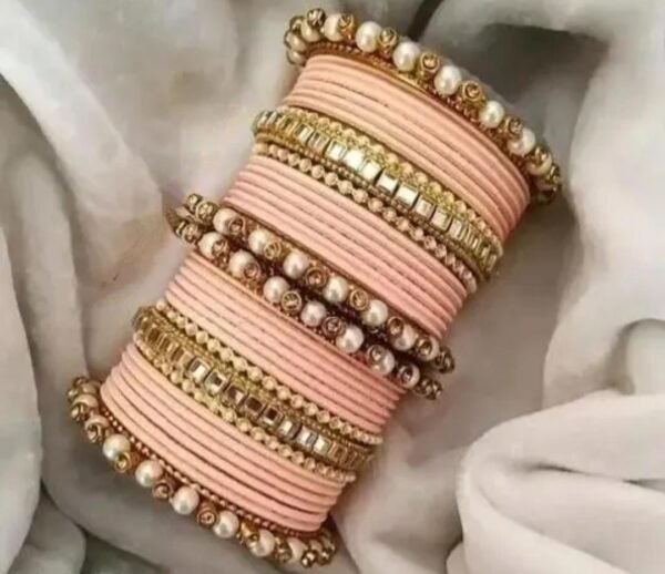 Main image showcasing the Peach Kundan Stone and Pearls Bangles Set, featuring intricate kundan and pearl work on a durable metal base, perfect for ethnic wear and special occasions.